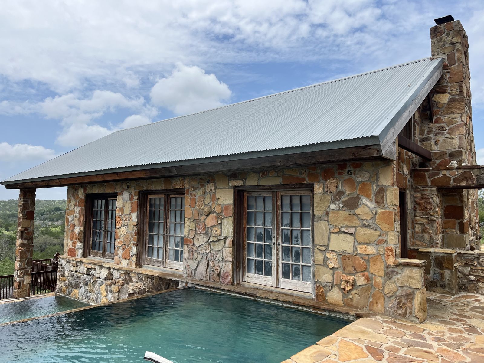 Canyon Room Home and pool, an existing building on the property